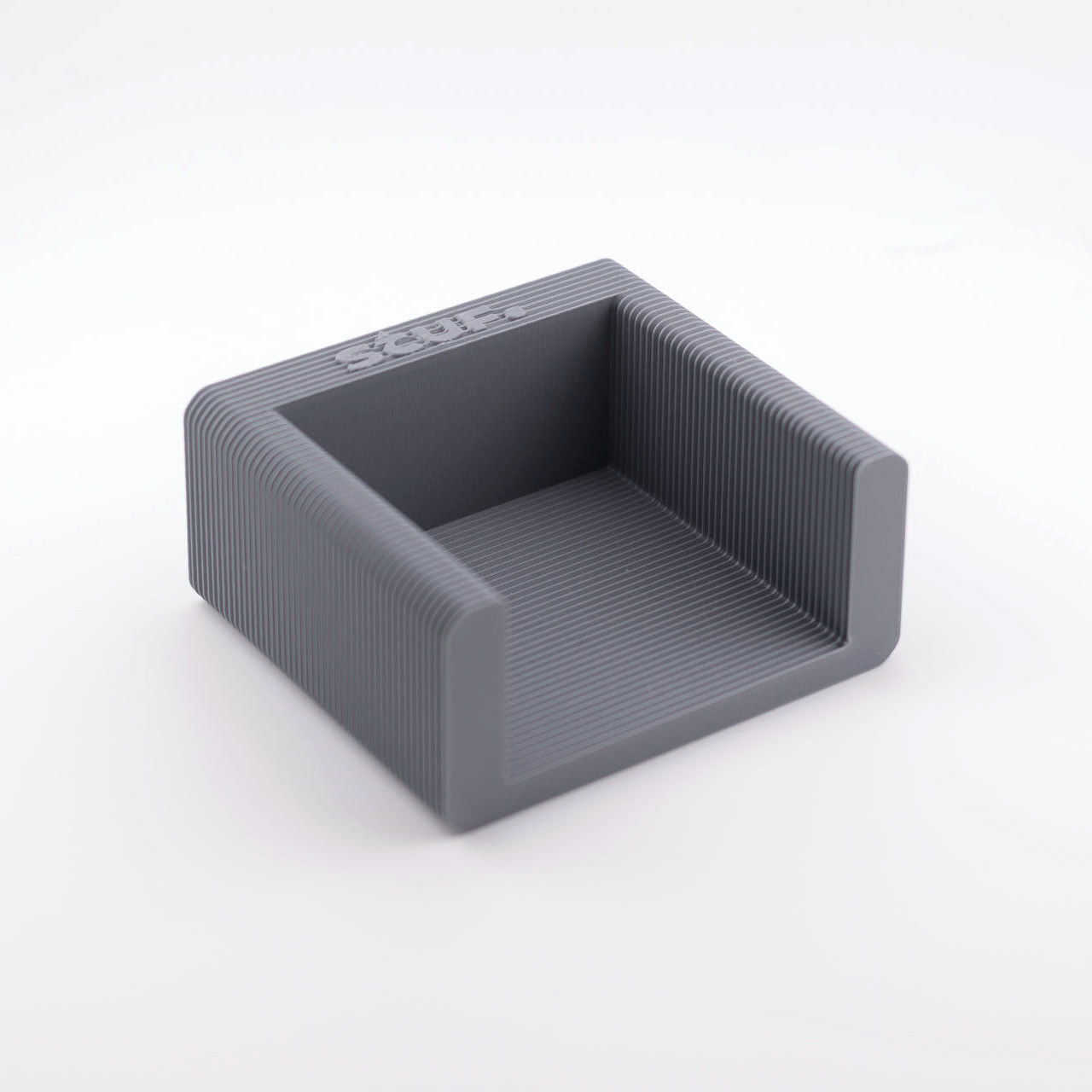 Note Block in Concrete Grey — clean studio product view